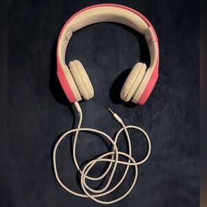 pink plug-in headphones